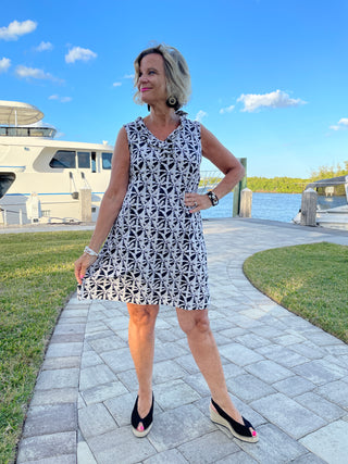 BLACK AND BEIGE RUFFLE DRESS